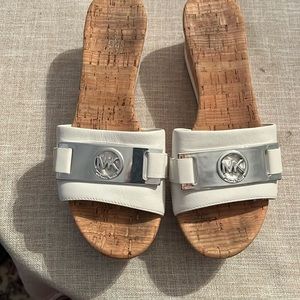 Michael Kors wedge mules. Size seven.